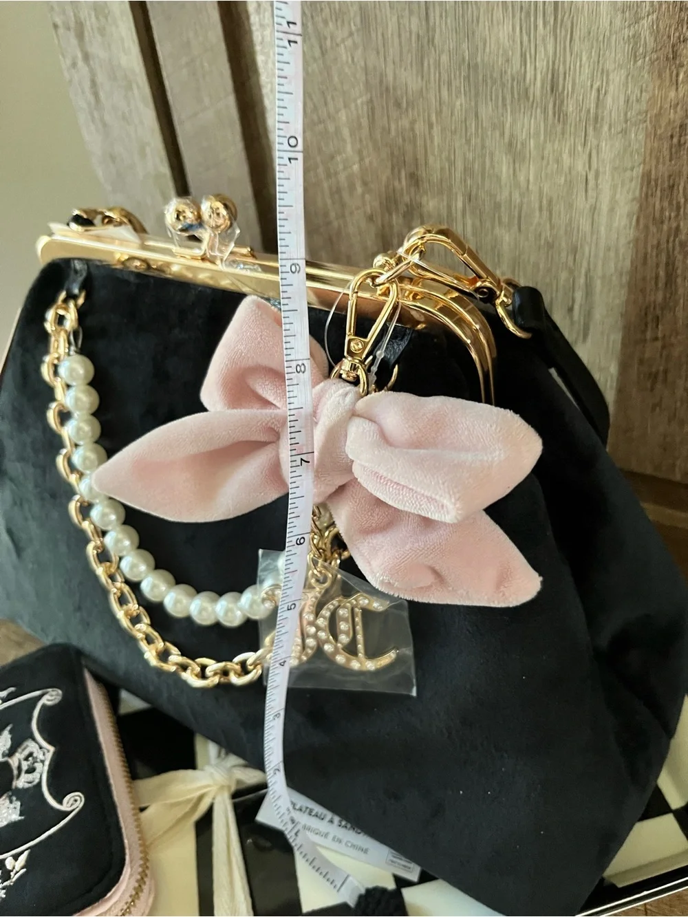 NWT Juicy Couture Lock Bag Pink Bow Pearl Chain Charm Haus Frame Clutch Licorice